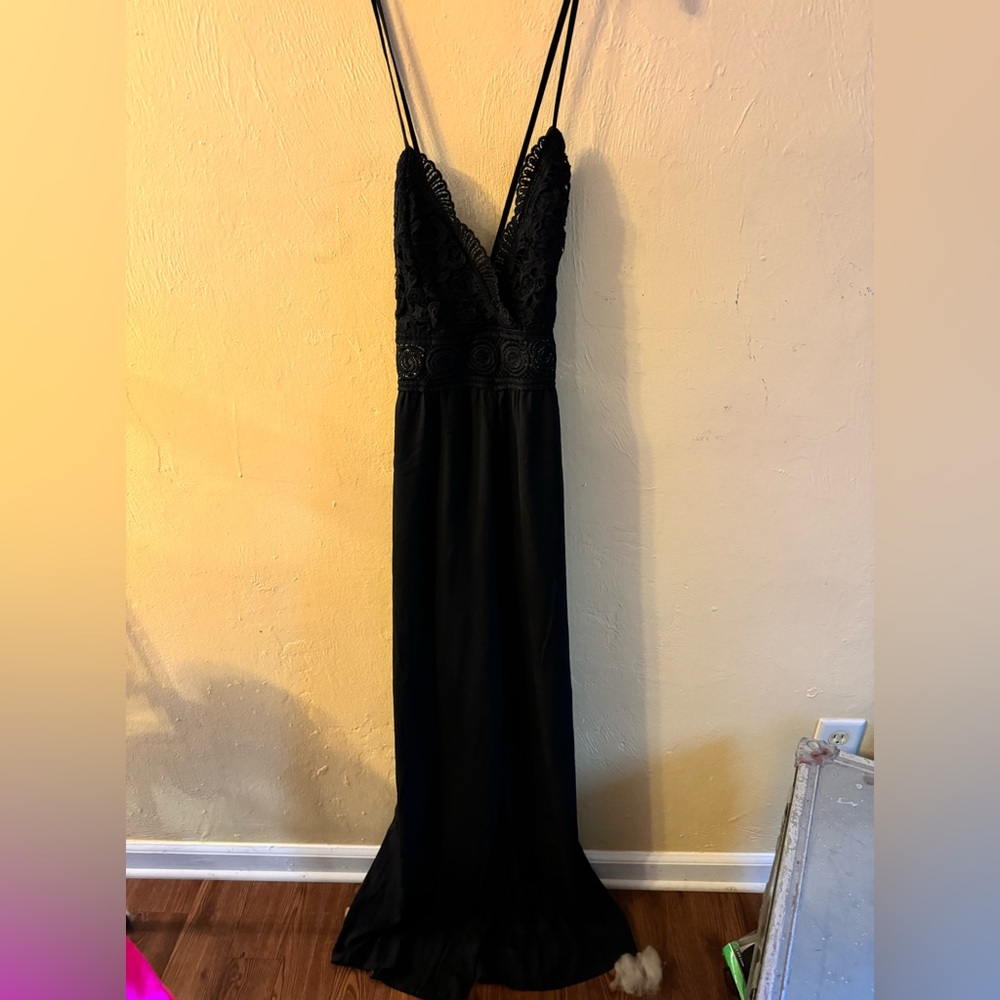 Blashe black jumpsuit with crochet top, with crisscross straps and tie back!